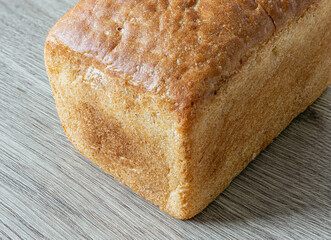 a loaf of white bread from Lithuania on the table