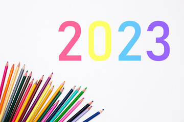 2023 school year with heap colored pencils isolated on white background. Banner. Creative development and education of preschoolers, children and adults. Art stationery shop card. Year color. Mockup.