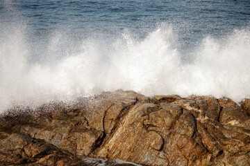 waves breaking on the rocks