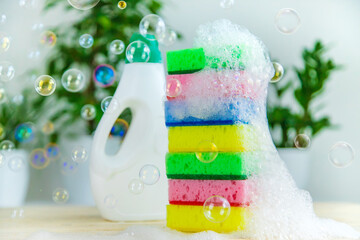 Eco household cleaner and sponge with foam. Selective focus.