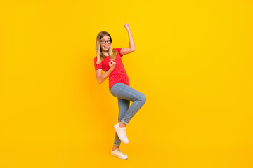 Fototapeta na wymiar Full size profile side photo of young cheerful lady rejoice success fists hands awesome isolated over yellow color background