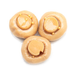 Pickled champignons isolated on a white background.