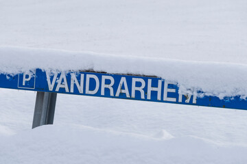 Sundsvall, Sweden A sign in Swedish for Vandrahem or Youth Hostel in a parking lot.
