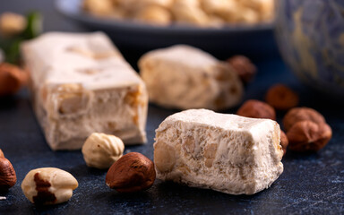 Soft nougats with hazelnuts on rustic table
