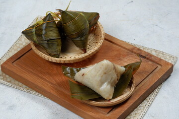 Zongzi, Bakcang or Bacang.Chinese savoury sticky rice dumplings .Traditional Chinese Food.Eat at...