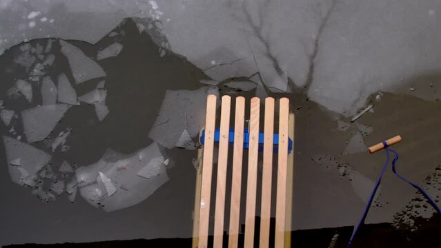 Wooden Sled on Thin Ice Lake, Danger of Drowning in Ice-Hole in Winter