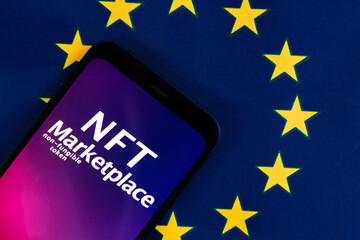 NFT marketplace in EU, Europe Union flag background. Non fungible token, crypto art and blockchain. Top view photo