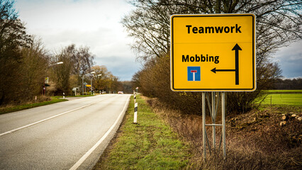 Street Sign to Teamwork versus Mobbing