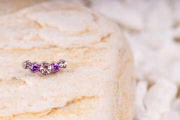 Beautiful piercing jewelry. Macro shot. Selective focus.
