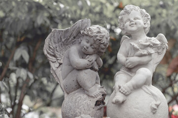 Sculpture of  angel in the park. Image made vintage tone.