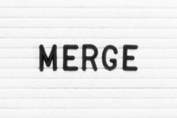 Black color letter in word merge on white felt board background