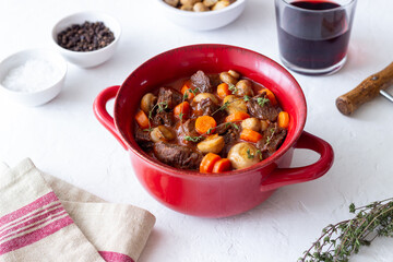 Beef bourguignon stew with carrots and mushrooms. French cuisine.
