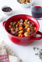 Beef bourguignon stew with carrots and mushrooms. French cuisine.