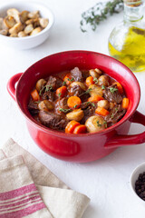 Beef bourguignon stew with carrots and mushrooms. French cuisine.