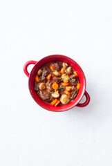 Beef bourguignon stew with carrots and mushrooms. French cuisine.