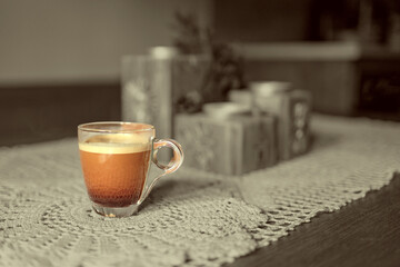 Cup of fresh coffee on the table.