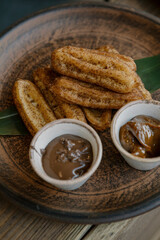 Portion of traditional spanish churros.