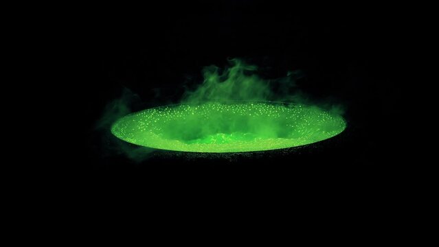 Green Witches Cauldron Isolated On Black