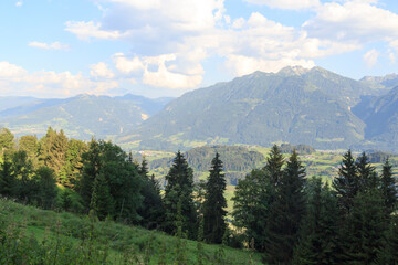 Panorama view with alpine mountains and blue sky in Salzburgerland, Austria