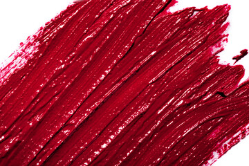 Beauty swatches. Lipsticks smear, palette of smudged lipsticks isolated on white background. Red color of cosmetic product smear sample