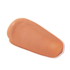 Liquid concealer face cream smear smudge swatch isolated on white background. Makeup foundation shades for beauty catalog. Nude cosmetic BB cream liquid foundation moisturizer. Beige color