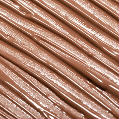 Liquid concealer face cream background smear smudge swatch macro. Makeup foundation shades for beauty catalog. Nude cosmetic BB cream liquid foundation moisturizer. Beige color