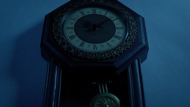 Old Pendulum Clock In The Dark Low Angle