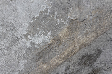 Cracked background with different cement layers of gray color palette . Horizontal image