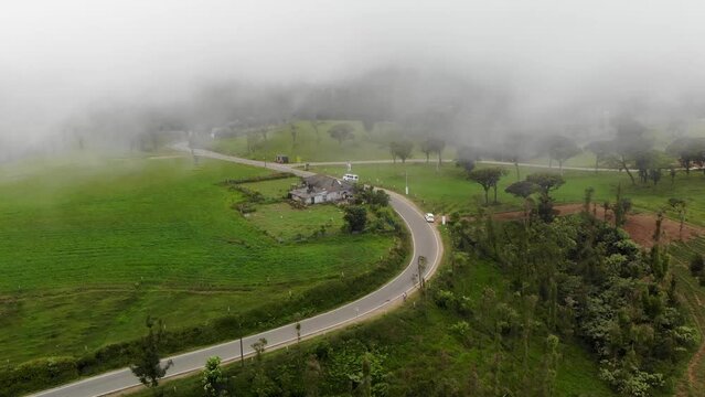 Aerial view of a road and clouds in Sri Lanka highland