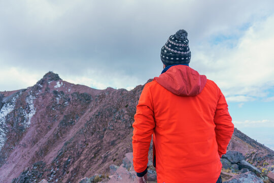 Man standing on mountain top