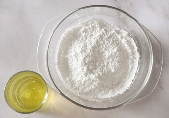 step of Cooking icing for cookies, powdered sugar with whites in a bowl, baking