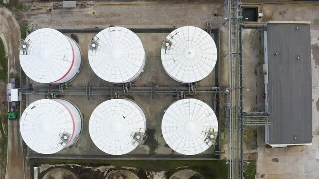 Liquid chemical tank terminal, Storage of liquid petrol fuel chemical and petrochemical product tank, Aerial view crude oil and gas terminal port, chemical industry factory.