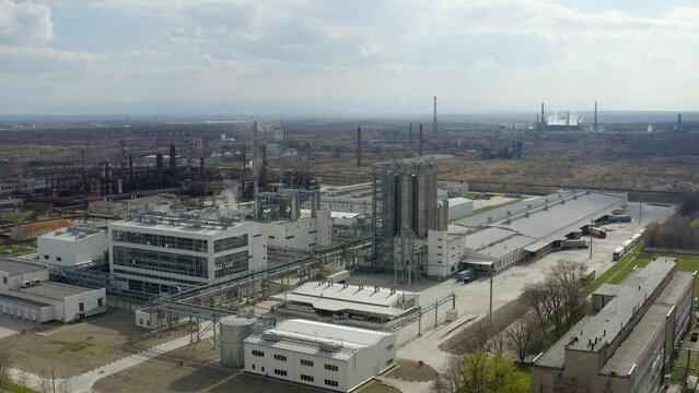 Chemical processing plant. Aerial view of Modern high-tech production. A giant chemical plant. A huge oil refinery with pipes and distillation of the complex. 