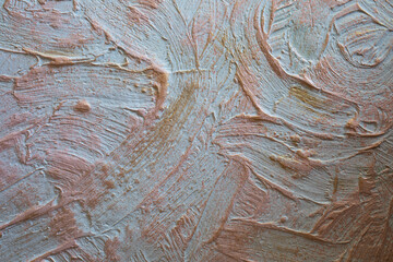 Stucco wall with gold paint