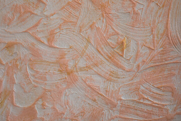 Stucco wall with gold paint