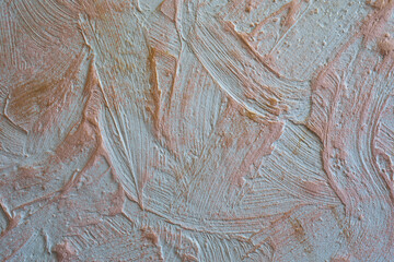 Stucco wall with gold paint