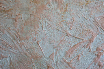 Stucco wall with gold paint