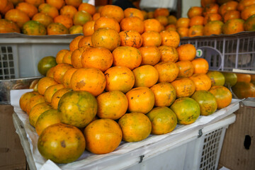 Indonesian local citrus fruit that tastes sweet and the color is a mixture of orange and green. This fruit is widely sold at a low price. This orange is not inferior in quality to imported oranges.