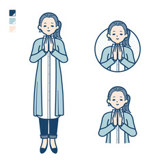 ロングシャツを着た女性が合掌しているイラスト