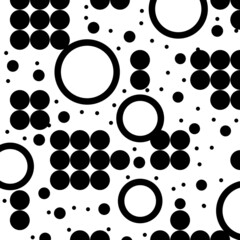 Black circles on a white background.