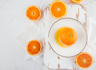 orange juice being squeezed