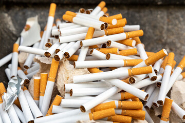 So many cigarettes in barbecue before burning, sign to stop smoking