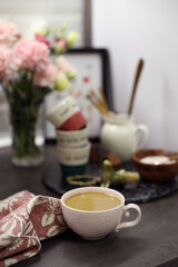 Coffee corner on the kitchen worktop, small glasses and a sugar bowl