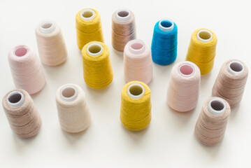 Spools of thread on a white background. Colored threads. 