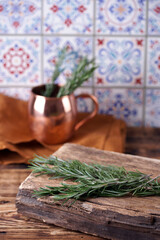 Rosemary on a wooden board in the kitchen