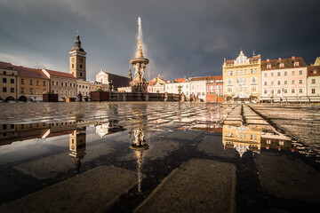 Fototapeta premium Historical city Ceske Budejovice in the Czech Republic in the evening after summer rain reflect in water
