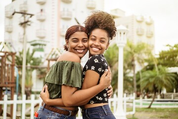 two african friends together and looking camera.