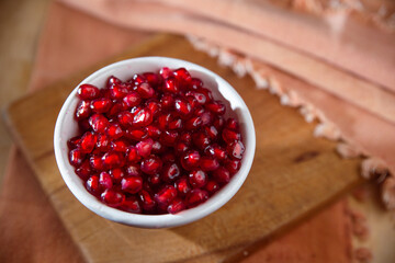 Pomegranate seeds or arils in a bowl