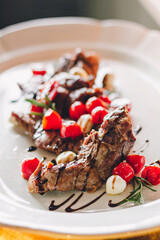 Catering table set service at restaurant before party. Meat with cherry tomatoes