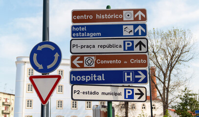 Tomar, Portugal - April 2018: Tomar city center with directional traffic sign, showing Convent of...
